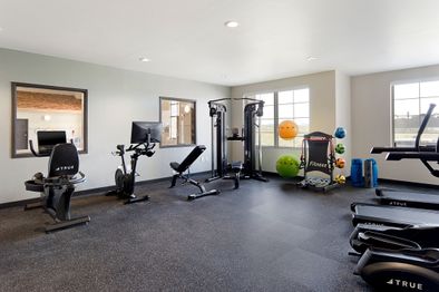On-site gym with treadmill, weights and more