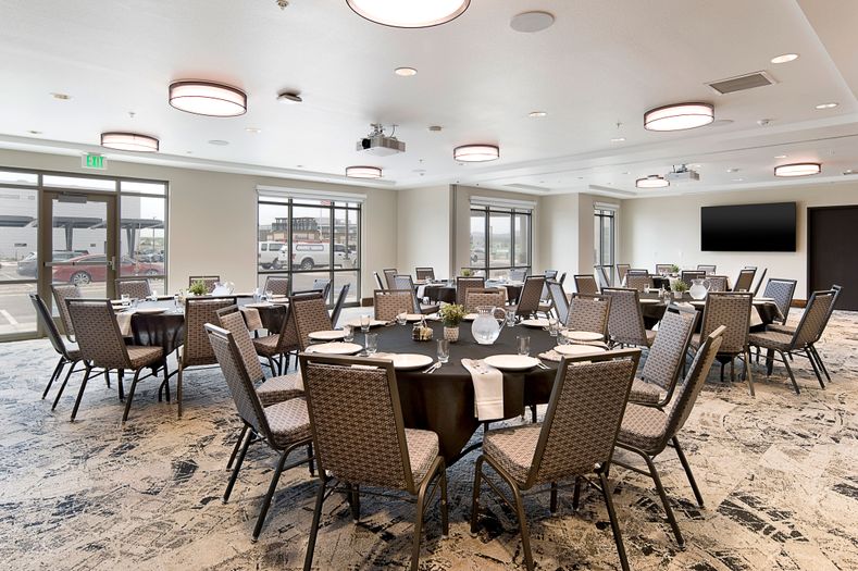 Room set up with round tables for banquet