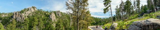 A group of bikers riding along Needles Highway